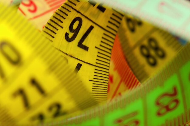 Close up of measuring tape of the tailor