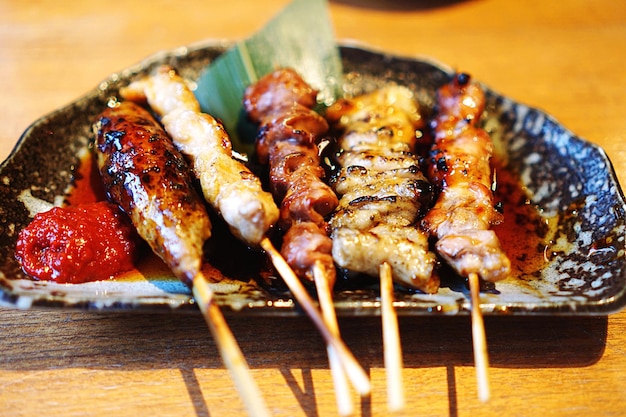 close-up of meat on barbecue grill