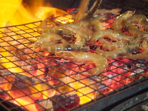 Close-up of meat on barbecue grill