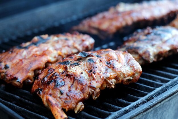 Close-up of meat on barbecue grill