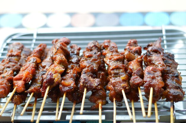 Close-up of meat on barbecue grill