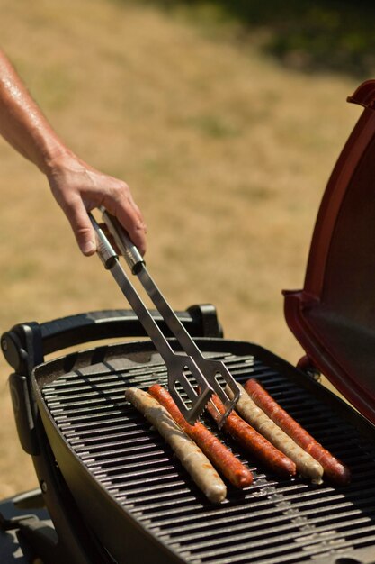 Photo close-up of meat on barbecue grill