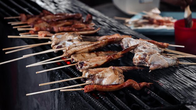 Close-up of meat on barbecue grill