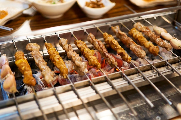 Close-up of meat on barbecue grill