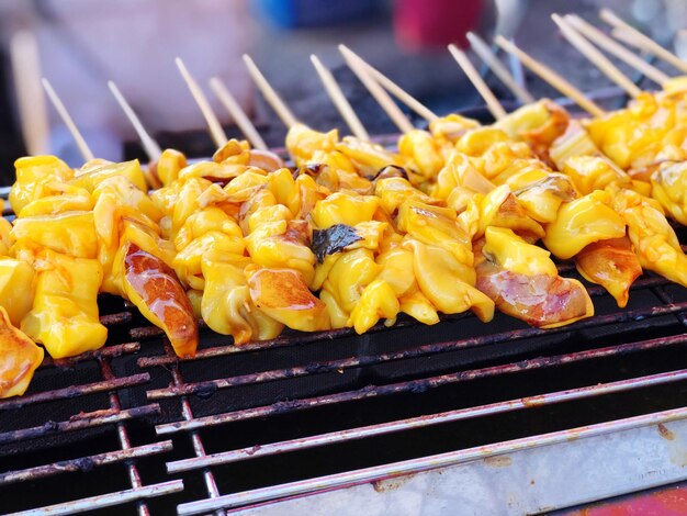 Close-up of meat on barbecue grill