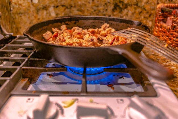 Close-up of meat in cooking pan