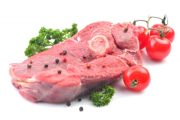 Close up on meat lamb with vegetables isolated