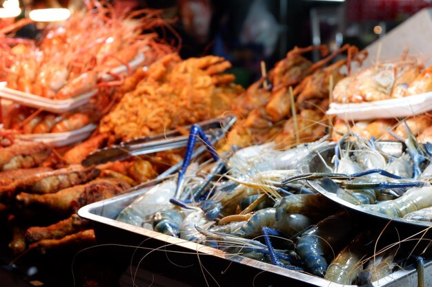 Photo close-up of meat for sale at market stall