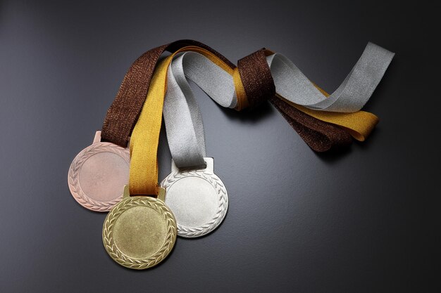 Photo close-up of medals on gray background