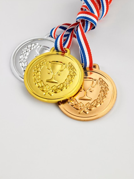 Photo close-up of medals over white background