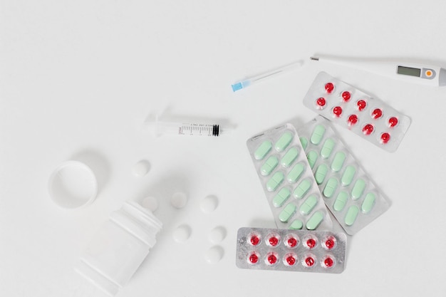 Close-up of medical supplies over white background
