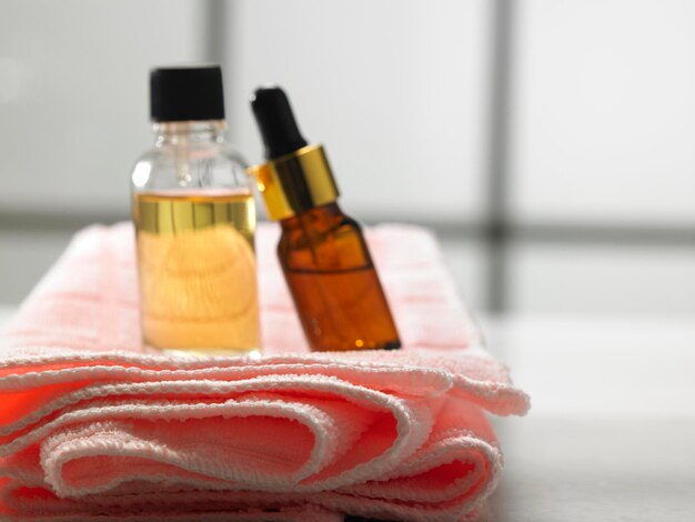 Close-up of medicine bottles on towel