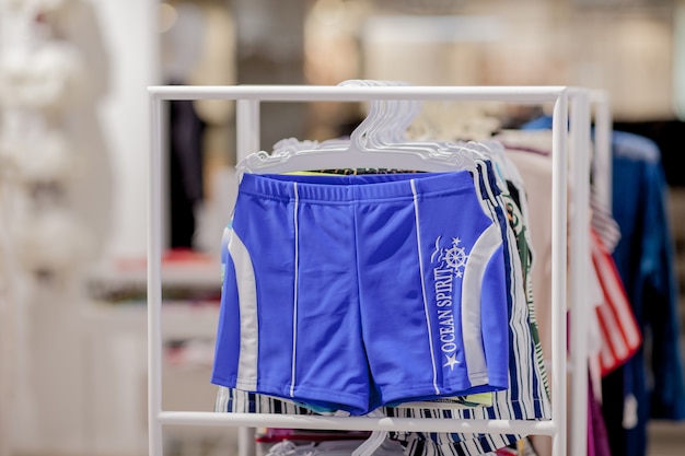 Close up Men's swimming trunks in the store