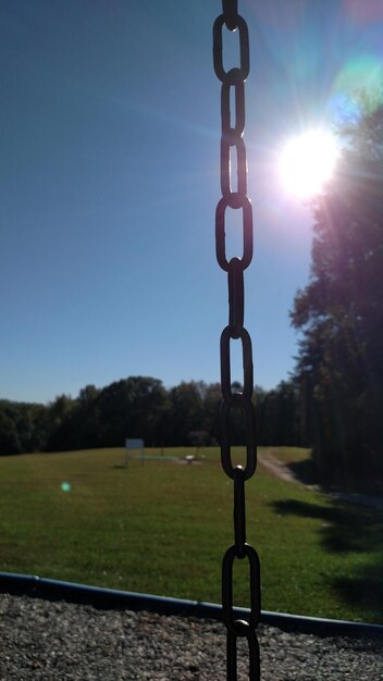 Close-up of metal against clear sky