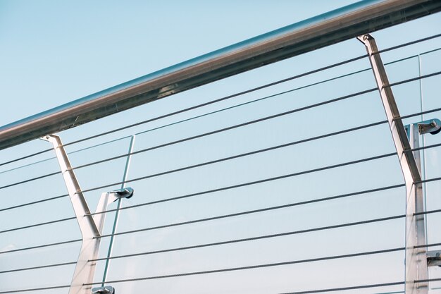 Close up of a metal banister of the bridge outdoors at daytime