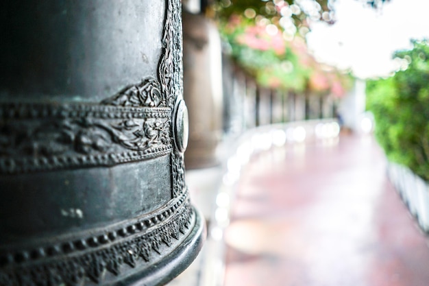 Close up metal bell with blur background Golden Mount Bangkok Thailand