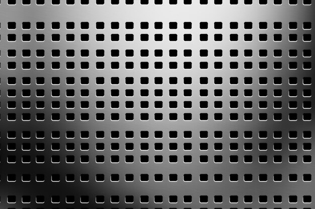 a close up of a metal grill grill plate with holes generative ai