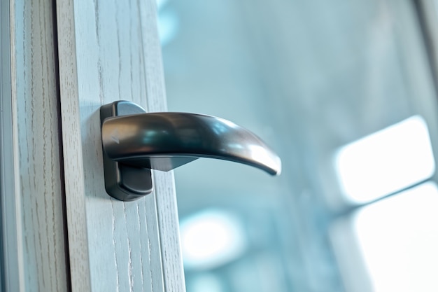 Close-up. metal handle on the window frame.