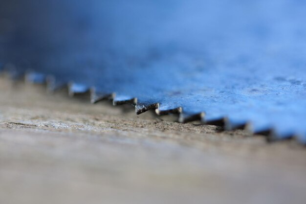 Close-up of metal on table