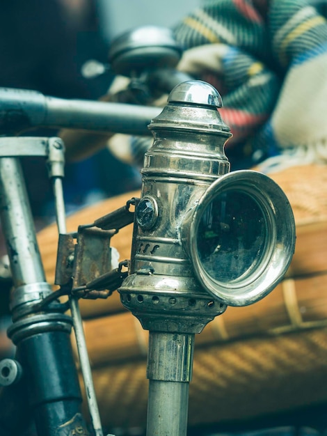 close-up of metallic equipment on bicycle handlebar