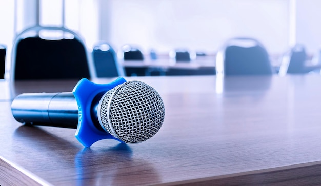 Close up microphone on table in seminar room