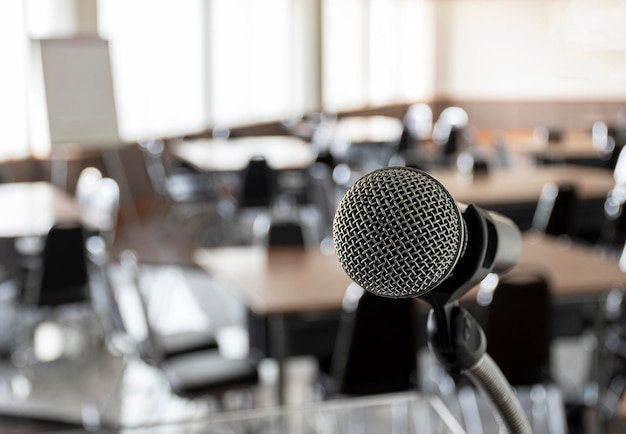 Close up microphone with tripod on stage in seminar room