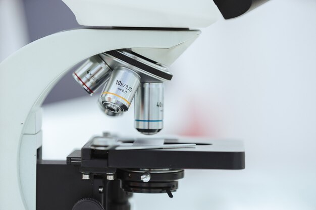 Close up. microscope with a sample on the table in the laboratory.