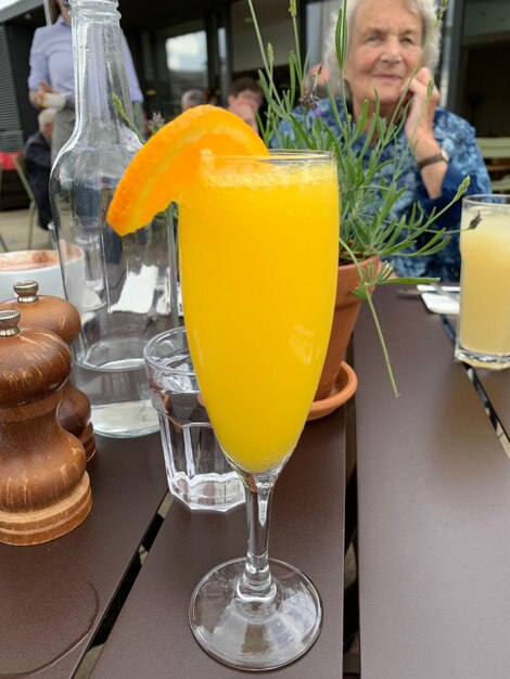 Close-up of mimosa cocktail on table