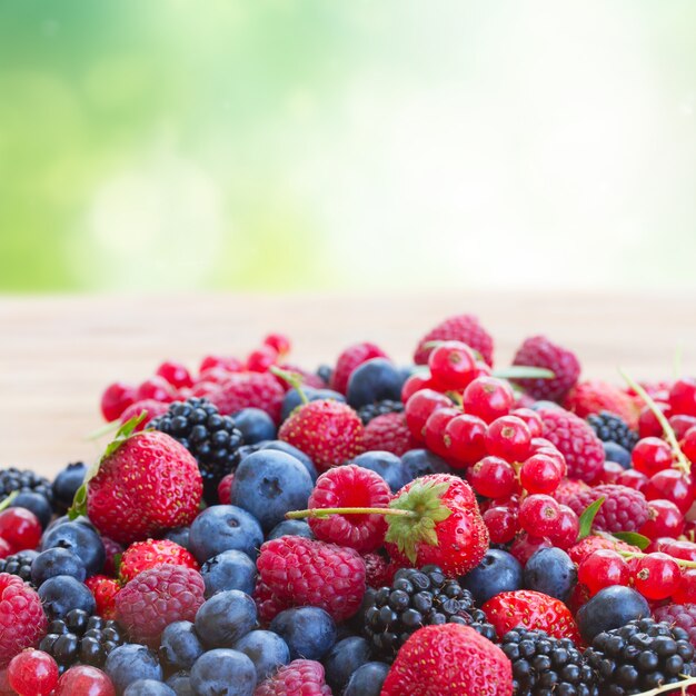 Close up on mix of piles of fresh berries