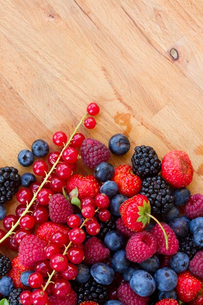 Close up on mix of piles of fresh berries