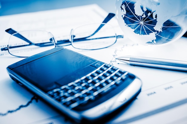 Close-up of mobile phone on table