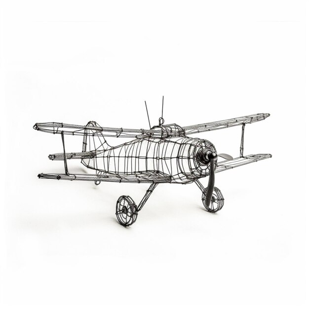 a close up of a model of a plane on a white surface generative ai