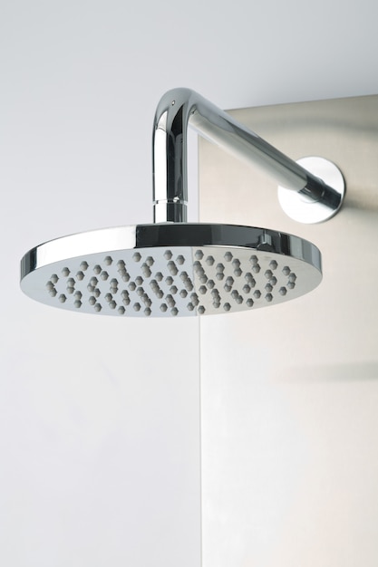 Photo close-up of modern chrome-plated stainless steel shower, for modern bathroom.