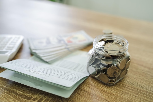 Close up of money stack coins and Dollar banknotes Saving money financial banking concept