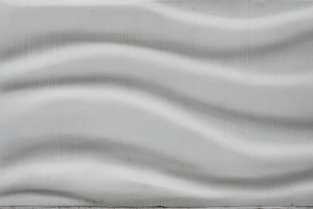 Close-up mooie witte muur versierd met lichaamsgolven
