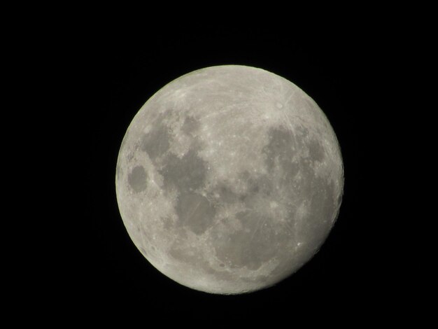 Close-up of moon against clear sky at night