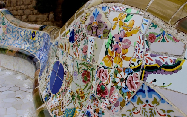 Close-up of mosaic tile bench at park guell