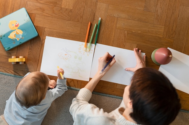 Close up mother and baby drawing