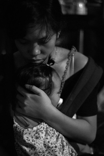 Photo close-up of mother with baby girl