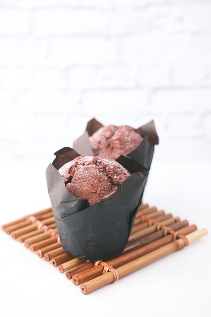 Close up of Muffins on Table Isolated on black