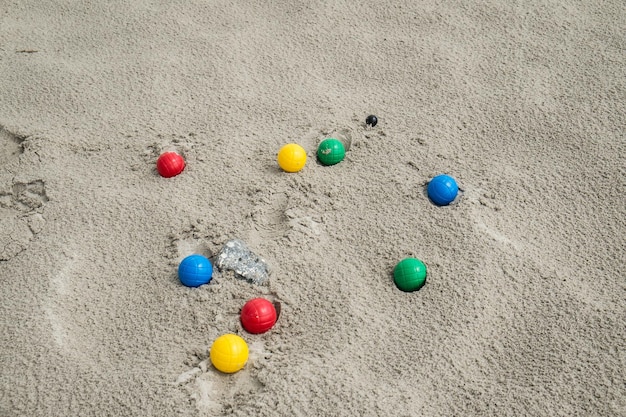 Close-up of multi colored balls on beach