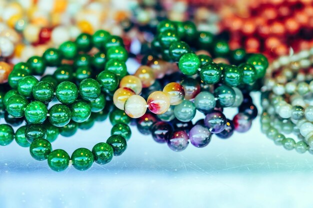 Photo close-up of multi colored bead on table