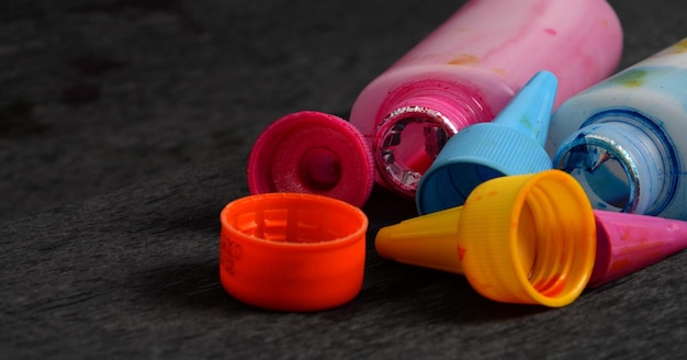 Photo close-up of multi colored bottle on table