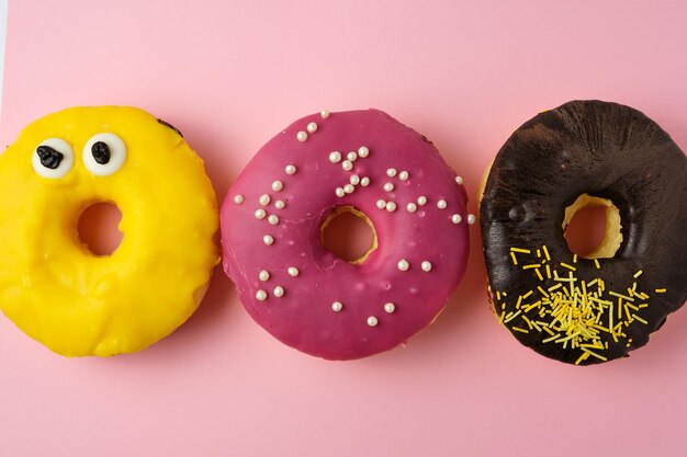 Close-up of multi colored candies against gray background