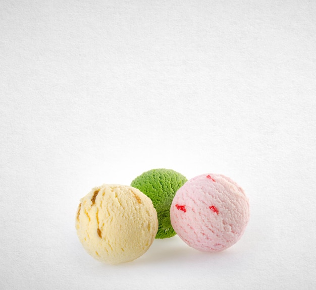 Close-up of multi colored candies against white background