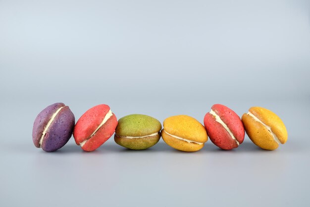 Close-up of multi colored candies against white background