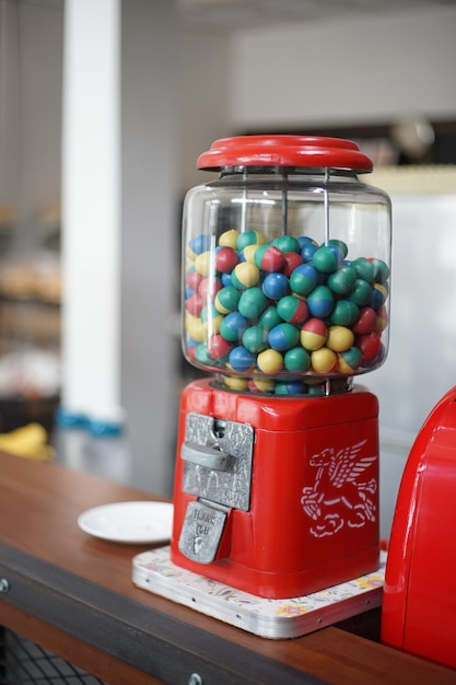 Photo close-up of multi colored candies in container