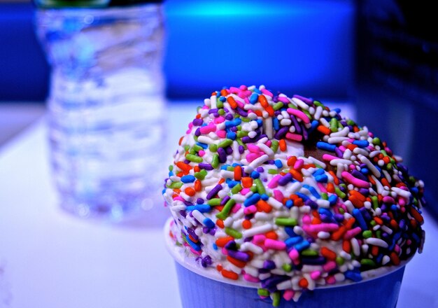 Close-up of multi colored candies on table