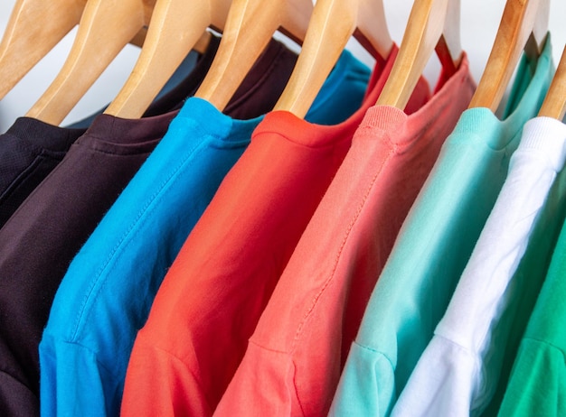 Close-up of multi colored clothes hanging on rack