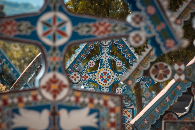 Close-up of multi colored handicrafts hanging for sale